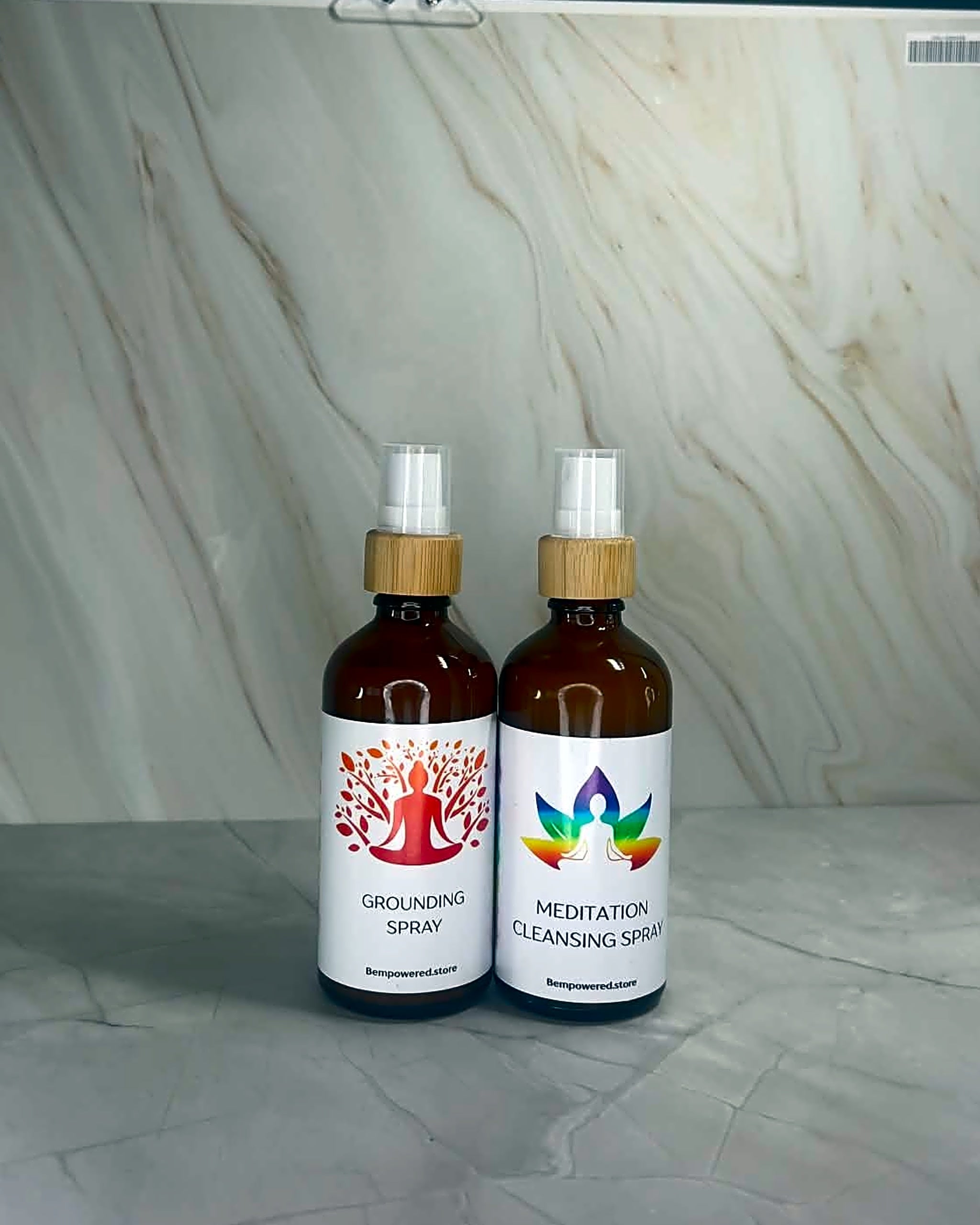 Meditation and Grounding sprays together on white marble