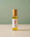 Root Chakra Roll-On Blend on sage background
