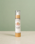 Rose & Sandalwood Face Cream on sage background